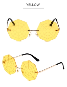 Vues détaillées des lunettes soleil sans bordure toile d'araignée jaune et or