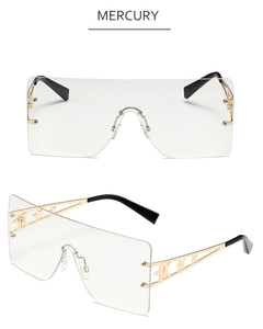 Detail of gold metal temples with hollow star patterns on oversized frameless sunglasses