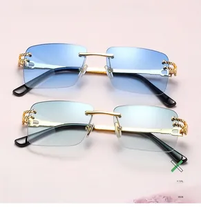 Detail of rimless rectangle sunglasses showing gold twist rope metal temples and nose pads