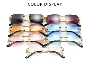 Detailed color display of rimless square sunglasses with gradient lenses and gold temples