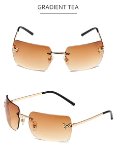 Detail of gradient tea rimless sunglasses with butterfly rhinestones and gold metal frames