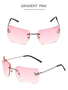Close-up of rimless Y2K sunglasses featuring crystal butterfly accents on pink lenses