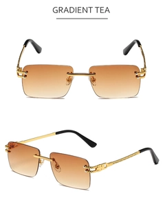 Detail of rimless square sunglasses with gradient tea lenses and engraved gold temples
