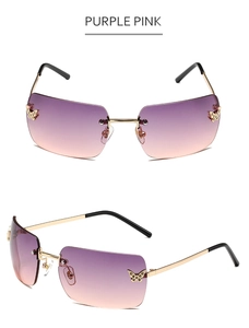 Detail of rimless Y2K sunglasses with purple pink gradient lenses and metal butterfly accents