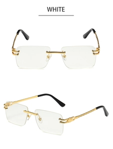 Detail of rimless gold metal glasses with wavy temples and clear rectangular lenses