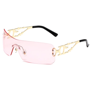 Lunettes Y2K roses à visière avec branches évidées en métal doré et verre unique