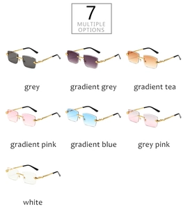 Macro view of rimless diamond cut sunglasses with golden snake textured metal temples