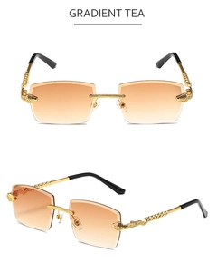 Detail of rimless rectangle sunglasses with snake-shaped metal hinges and gradient tea lenses
