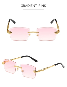 Detailed close-up of golden snake-embossed temples and pink gradient diamond-cut lenses