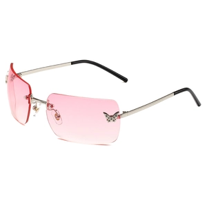 Y2K rimless butterfly sunglasses with pink gradient lenses and metal frames
