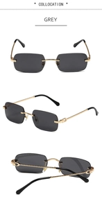 Detailed view of rimless grey sunglasses with golden metal C-hinge and braided arms
