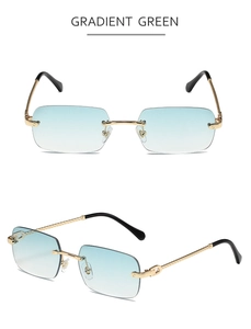 Detail of rimless rectangle sunglasses with gradient green lenses and textured gold temples