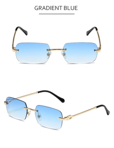 Detail view of rimless polygon sunglasses with gradient blue lenses and gold metal temples