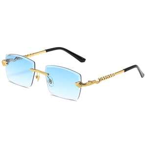 Frameless diamond cut sunglasses with blue gradient lenses and golden snake temples