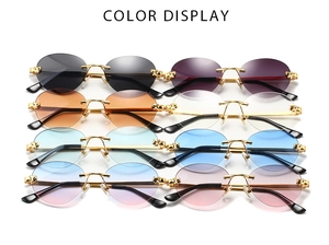 Collection of rimless sunglasses with gold cheetah head detail in multiple lens colors