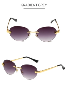 Close-up of golden leopard head hardware on rimless sunglasses with purple gradient lenses