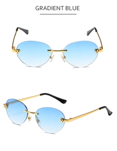 Detail of rimless metal sunglasses with gold leopard head decor and gradient blue lenses
