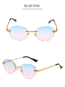 Detailed view of blue-pink gradient rimless lenses with golden leopard head accents