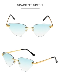 Detail of leopard metal ornament on gradient green rimless cat eye sunglasses