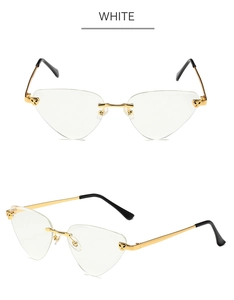 Detail of rimless leopard sunglasses with gold panther metal accents and wavy arms