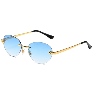 Rimless sunglasses with blue gradient lenses and gold leopard head hardware details