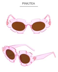 Détails de lunettes tournesol roses avec verres thé montrant les angles avant et profil