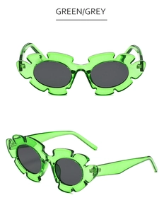 Vue de face et de profil de lunettes de soleil fleurs vertes avec verres gris foncé
