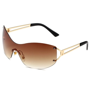 Vintage Y2K oversized rimless sunglasses with gold metal frame and gradient lenses