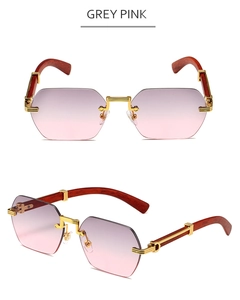 Detail view of rimless octagonal grey pink gradient lenses with wood texture temples