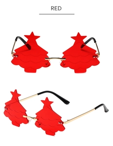 Detailed view of red Christmas tree shaped rimless sunglasses with gold metal frame