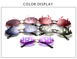 Varios colores de gafas de sol sin montura en forma de llama con puente de metal fino