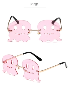 Detailansicht der pinkfarbenen geisterförmigen randlosen Sonnenbrille mit Metallbügeln