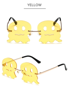 Gelbe Party-Sonnenbrille in Geisterform mit goldenen Metallbügeln und Cutout-Design
