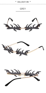 Trois vues de lunettes de soleil flamme avec verres gris et monture en métal doré
