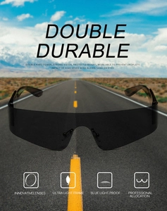 Detail einer rahmenlosen Sportsonnenbrille mit Panoramaglas auf Asphaltstraßen-Hintergrund