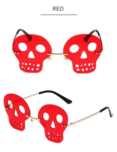 Front and side view of red skull-shaped rimless sunglasses for party and Halloween