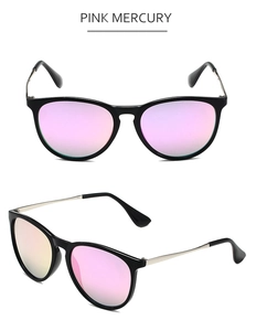 Detail view of aviator sunglasses with pink mercury lenses and slim silver metal temples