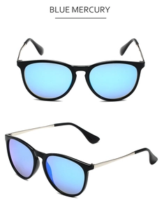 Detail of retro aviator sunglasses with blue mercury lenses and slim silver metal temples