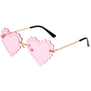 Pink heart-shaped rimless sunglasses with scalloped wavy edges and golden metal frame
