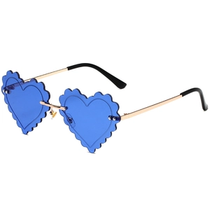 Blue heart-shaped rimless sunglasses with gold metal frame and wavy edge lenses