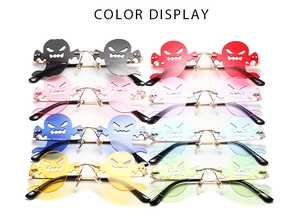 Ghost-shaped rimless sunglasses in eight vibrant colors for Halloween parties