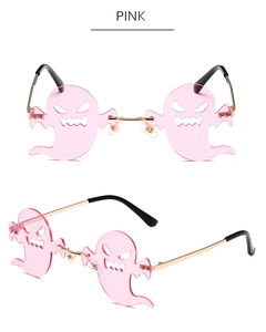 Close-up of pink ghost-shaped rimless sunglasses with gold metal temples and details