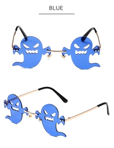 Close-up of frameless blue ghost-shaped lenses with gold metal temples and black ear tips