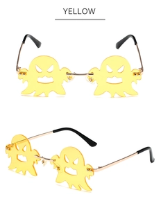 Detailansicht der gelben randlosen Sonnenbrille in Geisterform mit Metallrahmen