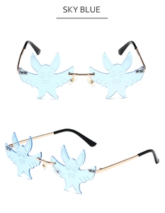 Macro view of sky blue bat shaped rimless sunglasses with cartoon lens engraving