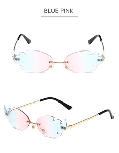 Detail view of flame-shaped rimless sunglasses featuring blue pink gradient lenses