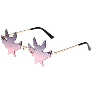 Frameless bat-shaped sunglasses with purple gradient lenses and gold metal temples