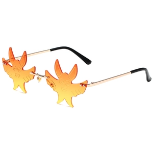 Trendy bat-shaped rimless sunglasses with orange gradient lenses and gold metal frames