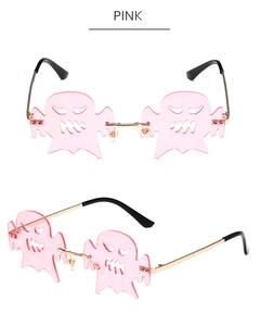 Randlose Sonnenbrille in Geisterform mit rosa Gläsern und goldenem Metallgestell