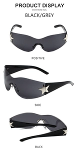 Lunettes de cyclisme sans monture avec verres noirs et détails d'étoiles argentées